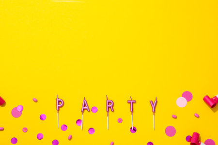 Concept of party decor and confetti, balloons and candles.の写真素材