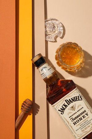 Ukraine, Kyiv, 01.11.2023, Jack Daniels whiskey with a glass on a beautiful backgroundのeditorial素材