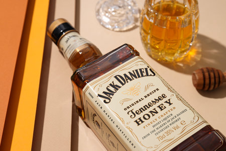 Ukraine, Kyiv, 01.11.2023, Jack Daniels whiskey with a glass on a beautiful backgroundのeditorial素材