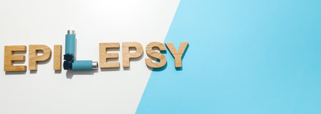 Epilepsy day written in wooden letters with inhalersの写真素材