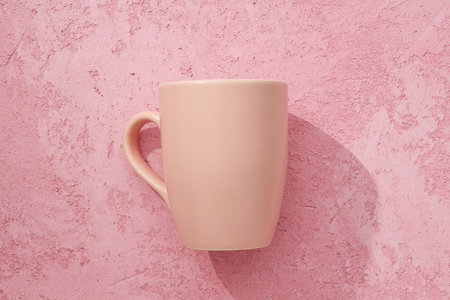 A beautiful cup on a pink background