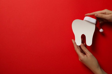 Teeth with Christmas accessories around, flat lay.の写真素材