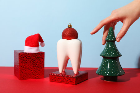 A tooth with a New Year's decoration around it.の写真素材