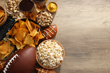 Beer with snacks and a rugby ballの写真素材