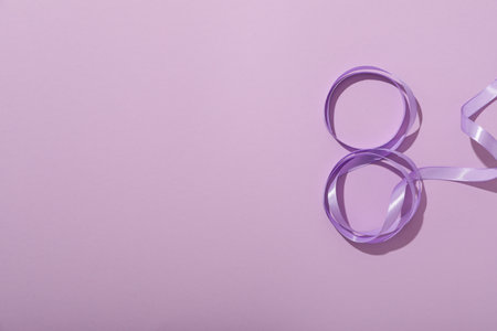 The number eight is made of satin ribbonの写真素材