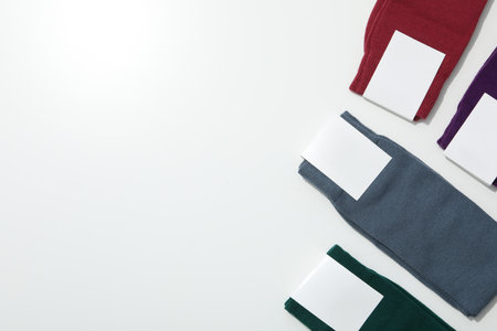 Multicolored high socks on a white background.の写真素材