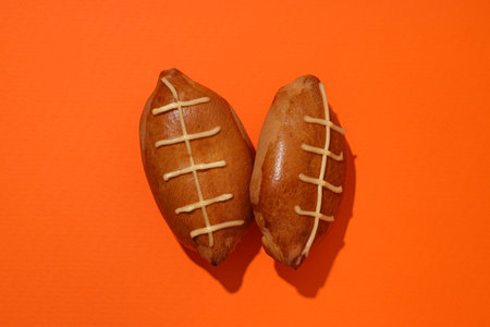 Buns in the shape of rugby ballsの写真素材