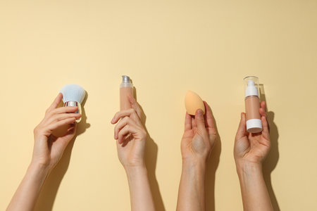 Decorative cosmetics for the face, in women's hands.の写真素材
