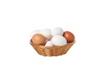 PNG, eggs in a round basket, isolated on white background.の写真素材