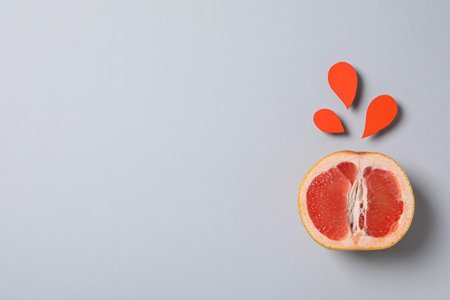 Juicy summer fruit - grapefruit, concept of fresh foodの写真素材