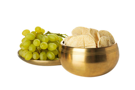 PNG, Bread and grapes in golden dishes, isolated on white backgroundの写真素材