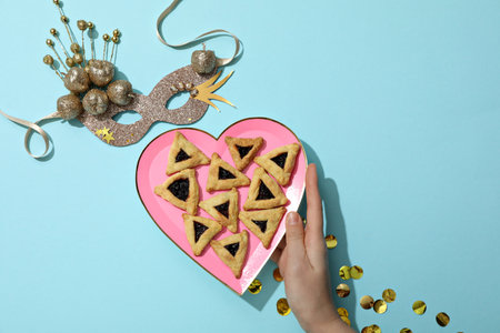 A mask with traditional cookies for the day of Purim.の写真素材