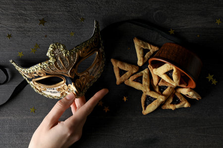 A mask with traditional cookies for the day of Purim.の写真素材