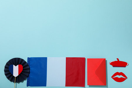 Flag of France and other symbols on a blue background.の写真素材