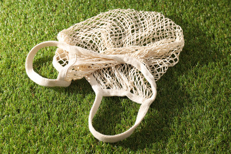 Eco bag, reusable, for shopping, on grass.