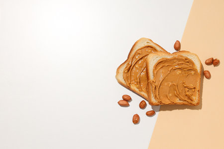 Sandwiches with peanut paste, on a light background.