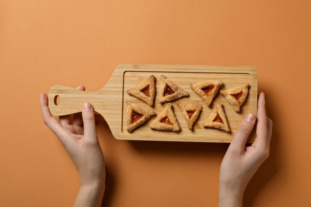 A mask with traditional cookies for the day of Purim.の写真素材