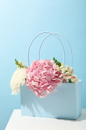 Beautiful, fresh flowers on a blue background.の写真素材