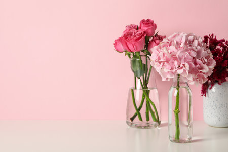 Beautiful, fresh flowers on a pink background.の写真素材