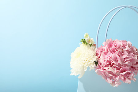 Beautiful, fresh flowers on a blue background.の写真素材