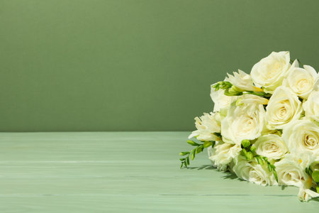 Fresh, beautiful flowers on a green background.の写真素材