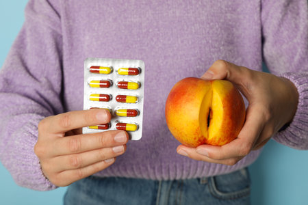 Hormonal pills for women, on a blue background.の写真素材