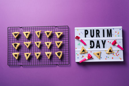 Purim holiday concept, with traditional symbols and decor.