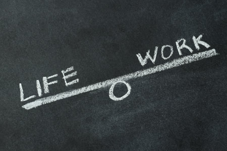 Work-life balance concept, drawing on a blackboard.の写真素材