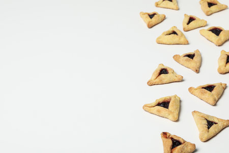 A mask with traditional cookies for the day of Purim.