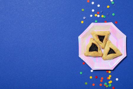 A mask with traditional cookies for the day of Purim.