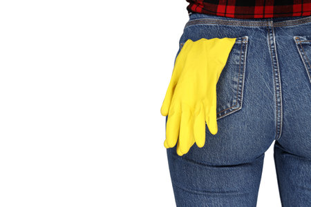 Housewife girl with means for cleaning the house, on a gray background.の写真素材