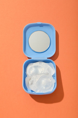 Contact lenses for eyes with a container for their storage