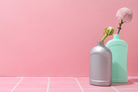 Detergents with flowers on a pink backgroundの写真素材