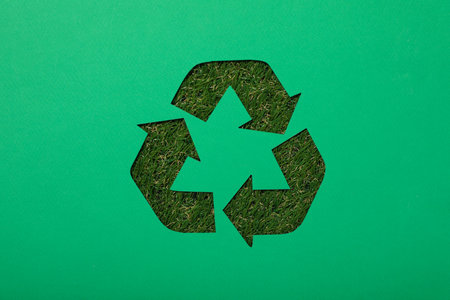 Material recycling sign on a green backgroundの写真素材