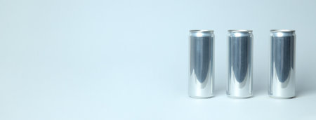 Tin cans for drinks on a white background