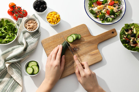 Cooking salad with tuna on a light background.