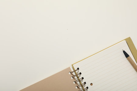 Notebook and stationery on the table, top view.の写真素材