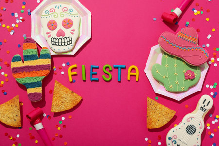 The inscription Fiesta with decorations on a pink backgroundの写真素材