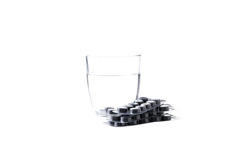 PNG, a plate of activated carbon with water, isolated on a white background.の写真素材