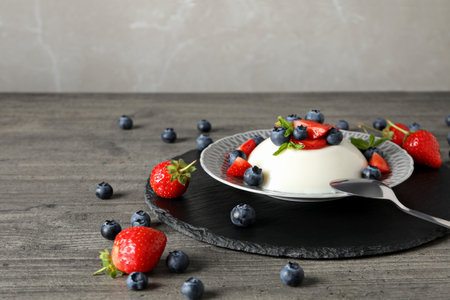 Dessert panna cotta, on the table, on a gray background.の写真素材