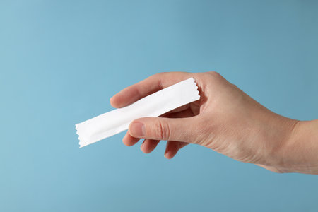 Collagen in a white stack on a blue backgroundの写真素材