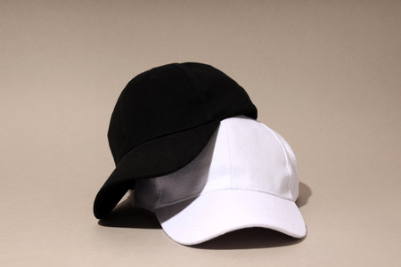 Black and white caps on a light background