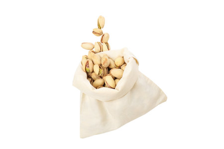PNG, pistachios in a linen sack, isolated on a white background.の写真素材