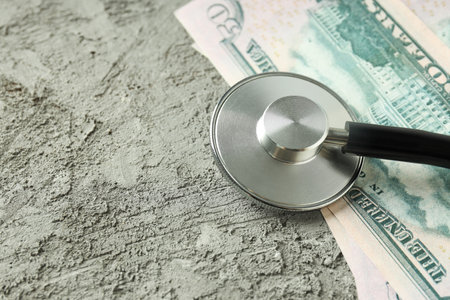 Money with medical equipment, concept of corruption in medicine.の写真素材