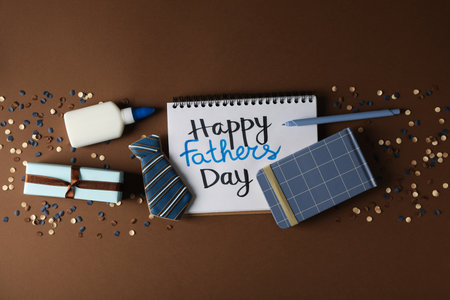 Father's day concept, gifts and greetings, on a brown background.の写真素材