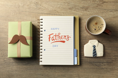 Happy father's day inscription, inscription in notebook, with gifts.の写真素材