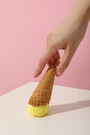 Melon flavored ice cream on a pink backgroundの写真素材