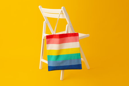 Concept of lgbt parade, rainbow shopper, on color background.の写真素材