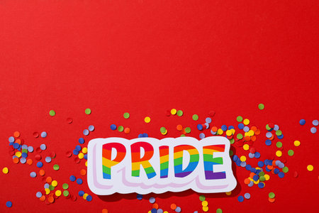 LGBT parade concept, colorful symbols on red background.の写真素材