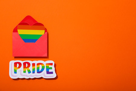 LGBT parade concept, symbols on orange background.の写真素材